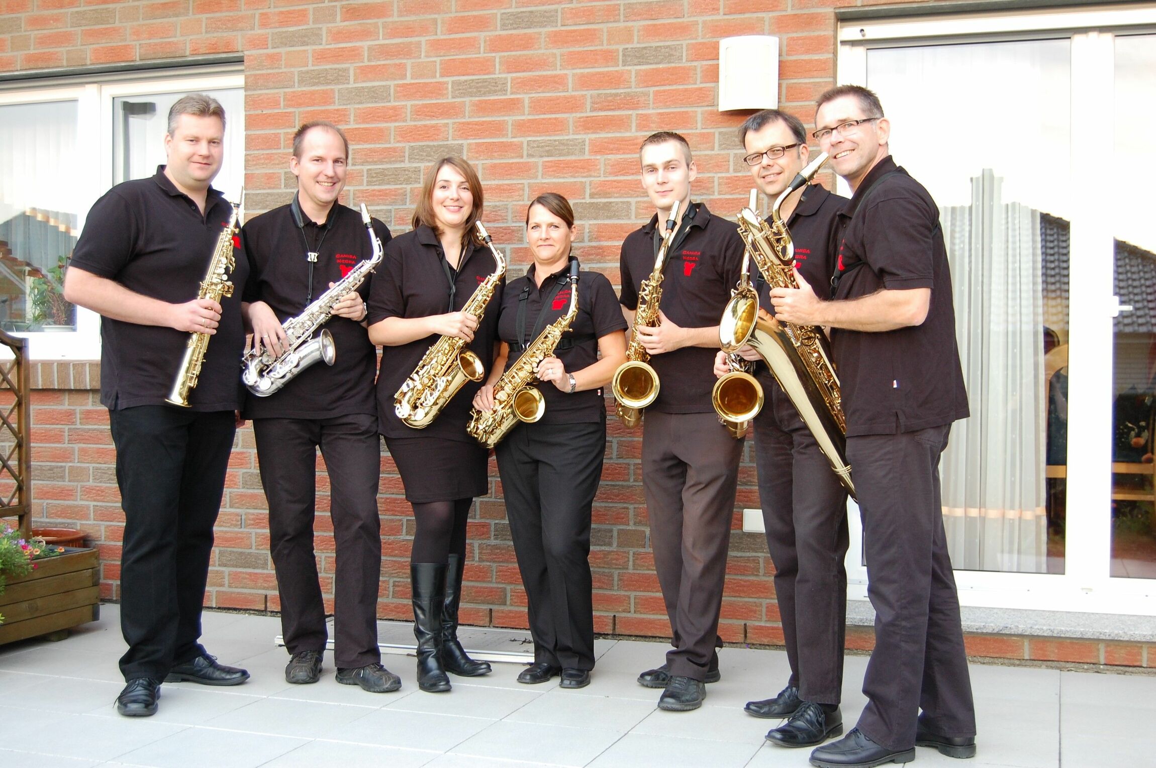 web_camisa_negra_2026